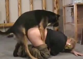 Big booty lady in khaki pants getting fucked by her dog from behind
