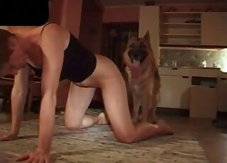Short-haired mature broad anticipates sex with German Shepherd